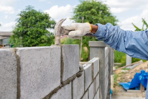Budget pour un mur de clôture en maçonnerie : conseils d’experts